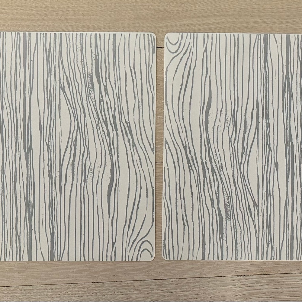 Beautiful Michael Aram woodgrain silicone placements.